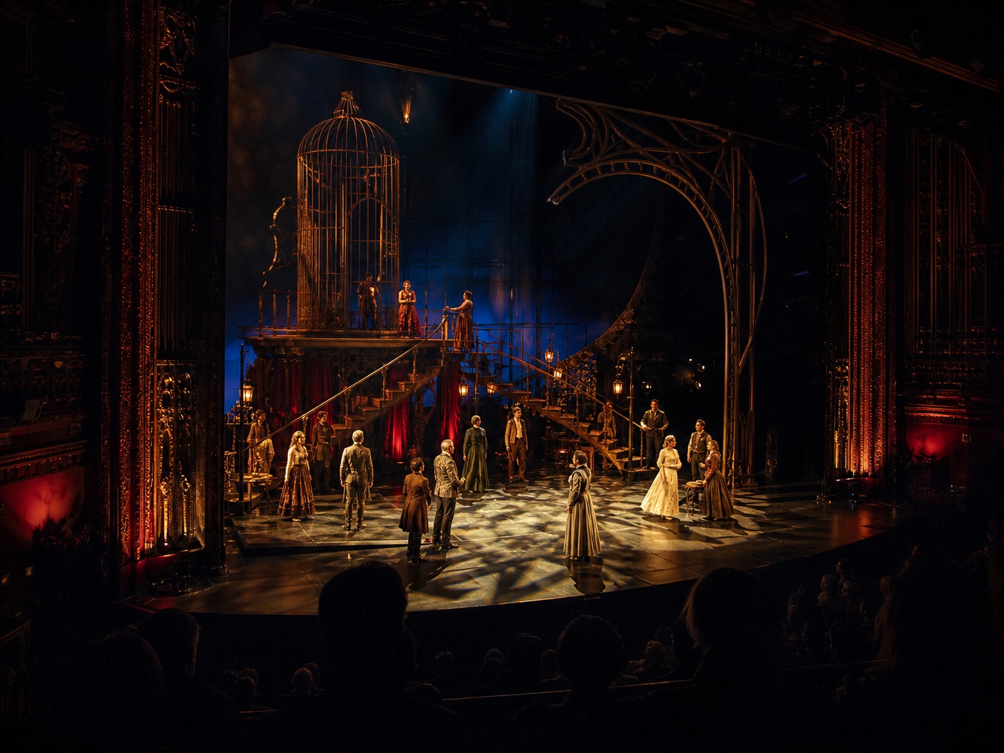 A large ensemble performing on an ambitious theatre set